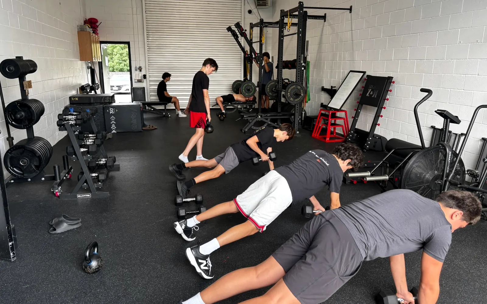 Athletes training on the gym floor at Inner Athlete