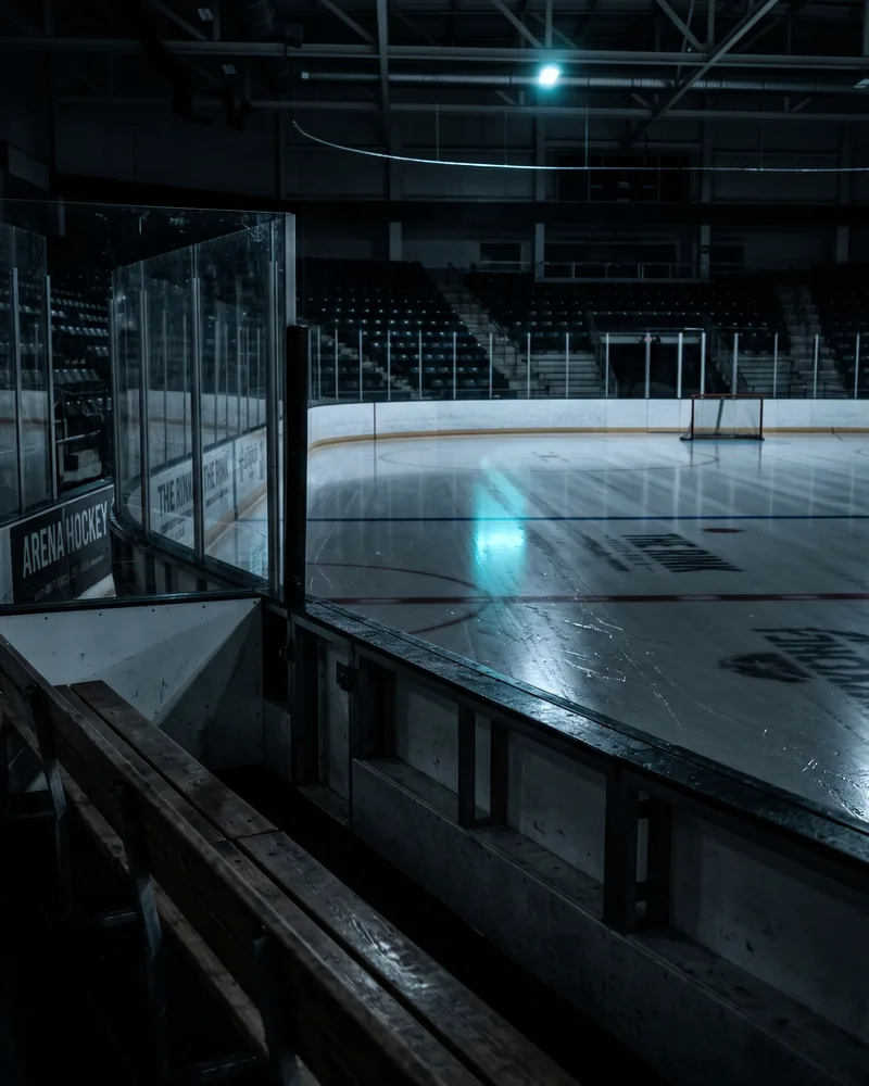 An empty ice rink at dawn