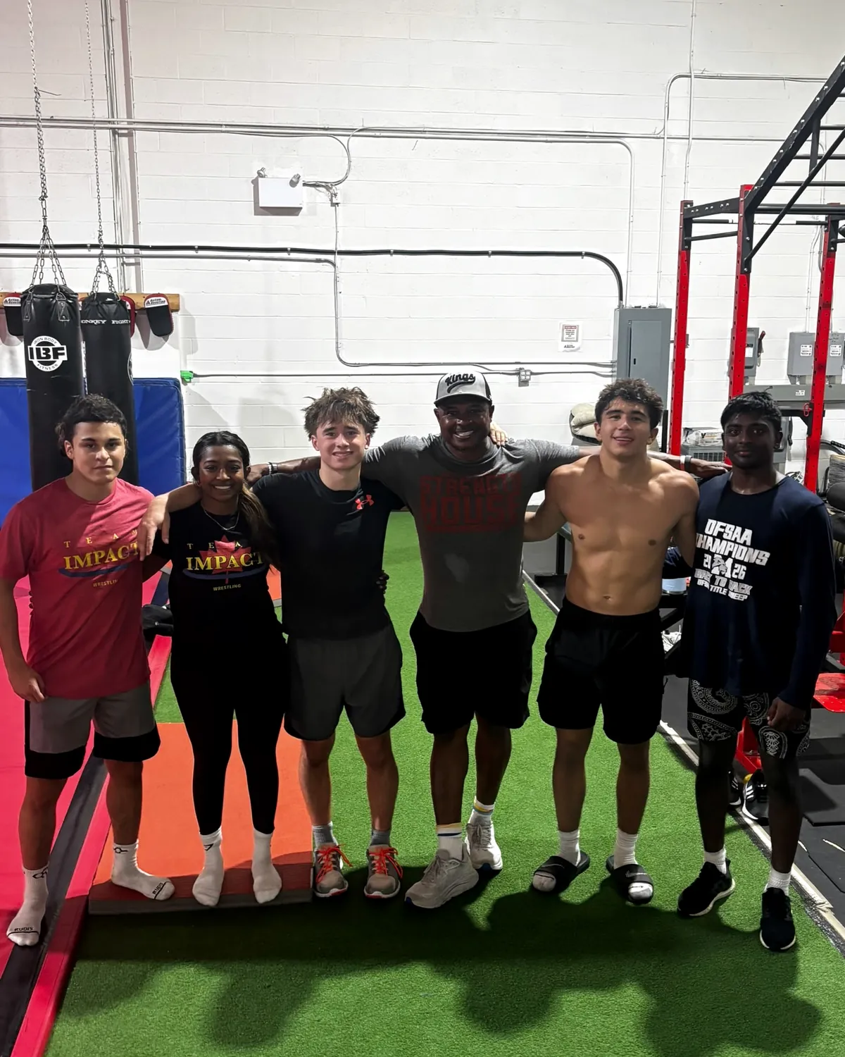 Daryl Devonish with athletes after a session